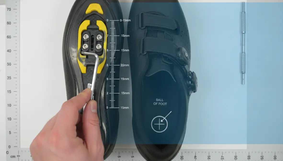 Fore-aft cycling cleat adjustment showing ball of foot positioning technique