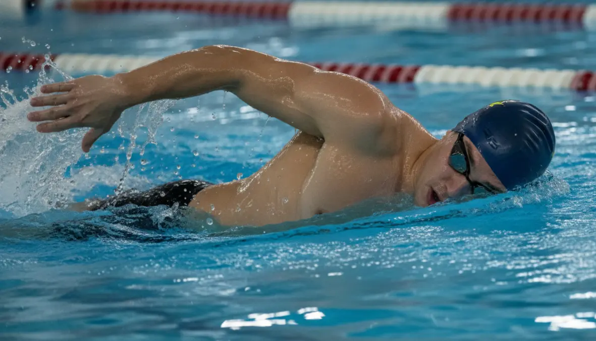 Proper freestyle swimming technique demonstration for endurance training cyclists